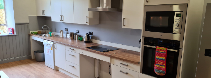 Accessible kitchen with microwave oven and sink